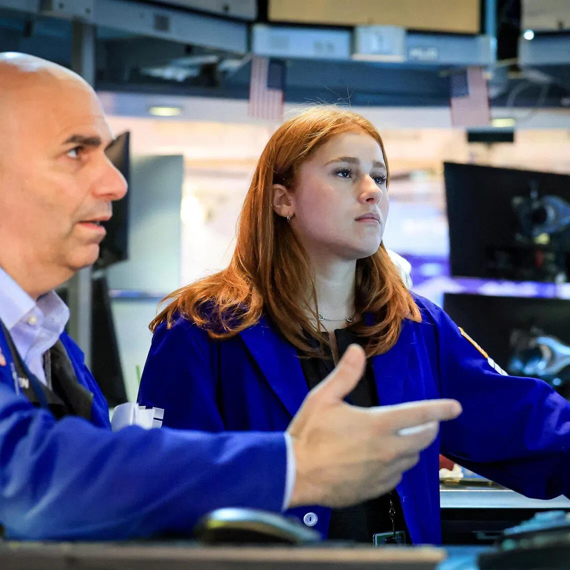 Traders working on the floor of the New York Stock Exchange, in New York City, on July 15.