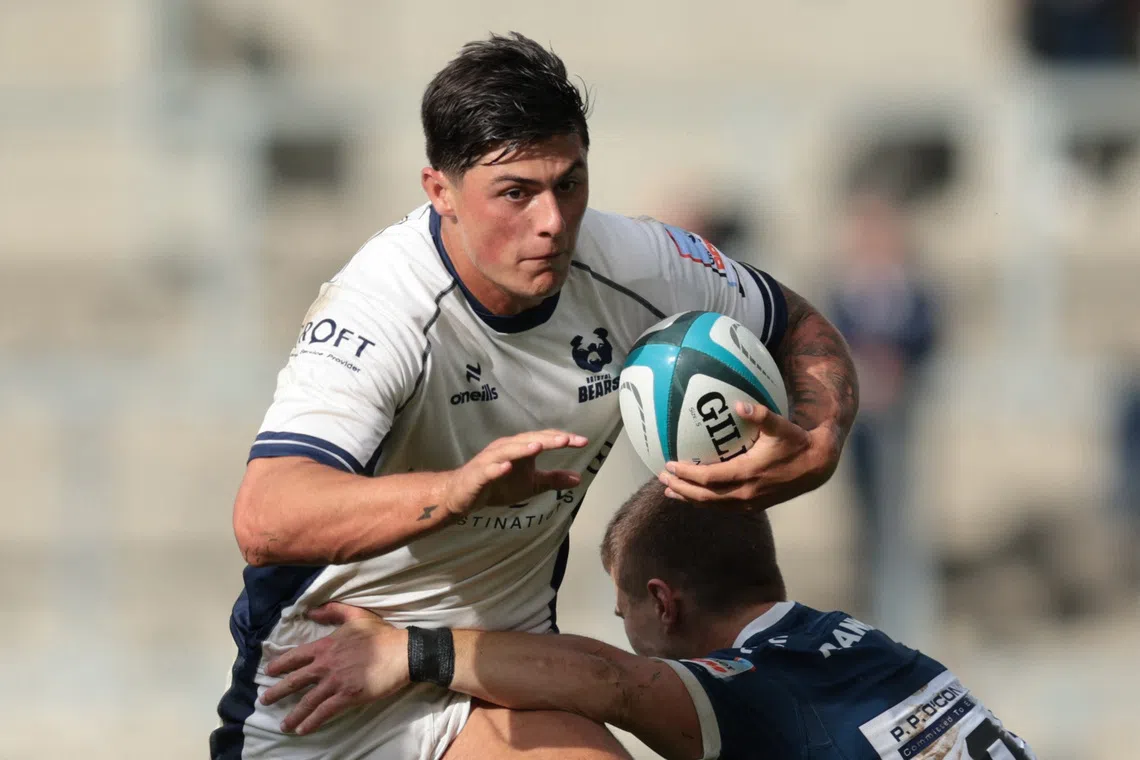 Rugby Union - Premiership Rugby Cup - Sale Sharks v Bristol Bears - Salford Community Stadium, Salford, Britain - September 13, 2025 Bristol Bears' Louis Rees-Zammit in action with Sale Sharks' Nye Thomas Action Images/John Clifton