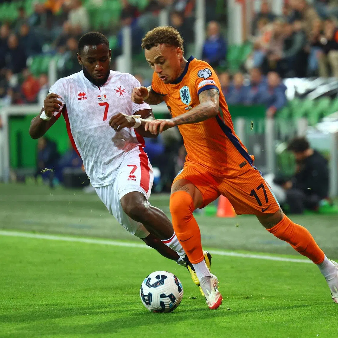 FILE PHOTO: Soccer Football - World Cup - European Qualifiers - Group G - Netherlands v Malta - Euroborg Stadion, Groningen, Netherlands - June 10, 2025 Netherlands' Noa Lang in action with Malta's Joseph Mbong REUTERS/Piroschka Van De Wouw