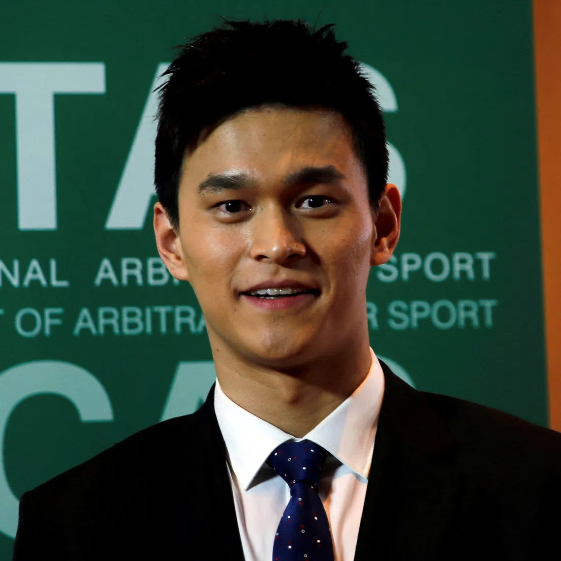 FILE PHOTO: Chinese swimmer Sun Yang poses after a public hearing of the Court of Arbitration for Sport (CAS) for the appeal filed by the World Anti-Doping Agency (WADA) against him and the Federation Internationale de Natation (FINA), at the Conference Centre of the Fairmont Le Montreux Palace, in Montreux, Switzerland November 15, 2019. REUTERS/Denis Balibouse/File Photo
