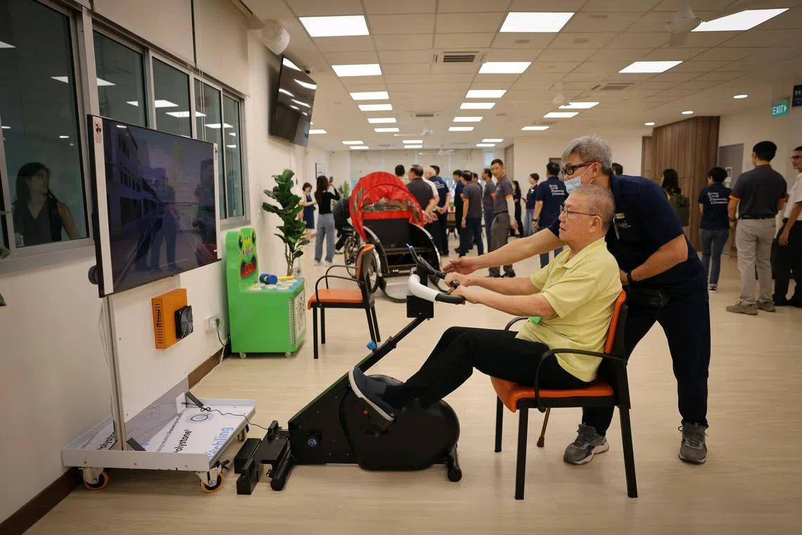 Mr. Hoong Yan Pui (sitting), 74, at the REACH-SLEC Active Ageing Centre (Care) @ Teck Whye Vista by REACH Community Services and St Luke?s ElderCare (SLEC), on the day of its official opening, Oct 11, 2024.

Mr Gan Kim Yong, Deputy Prime Minister, Minister for Trade and Industry, and Member of Parliament for Chua Chu Kang GRC, was the guest-of-honour.

This collaboration between REACH Community Services and St Luke?s ElderCare (SLEC) to jointly run an Active Ageing Centre (Care) is the first of its kind for the eldercare sector and aligns with Singapore?s Age Well SG strategy to build a future-ready and integrated care ecosystem. It brings three services under one roof: day care and day rehabilitation services by SLEC, and active ageing activities by REACH.