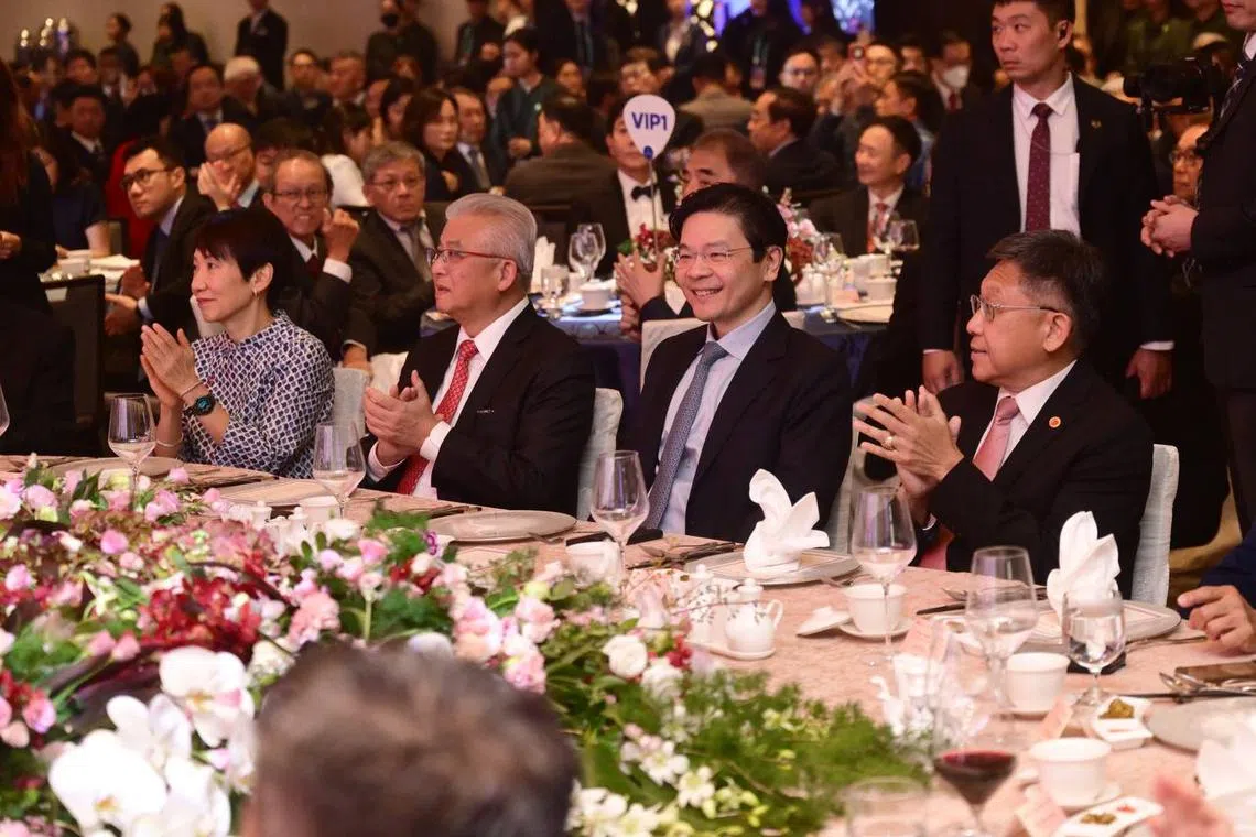 Prime Minister Lawrence Wong (second from right) at the welcome dinner co-organised by the SFCCA and the SCCCI on Nov 29.