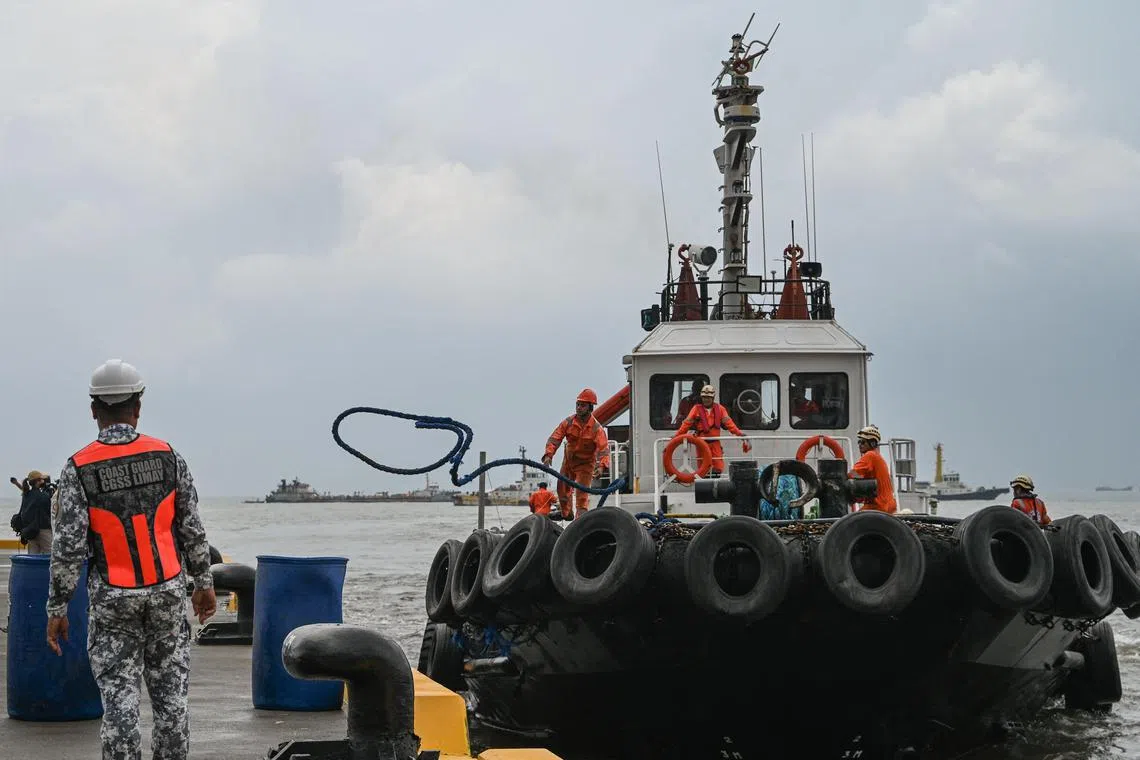 The Philippine coast guard said a private company is transferring the cargo.