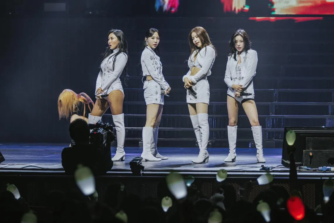 The members of Mamamoo, (from left) Hwasa, Moonbyul, Solar and Wheein, showed off their powerful vocals in a three-hour set on Feb 8, the first of their two sold-out nights playing The Star Theatre in Singapore.