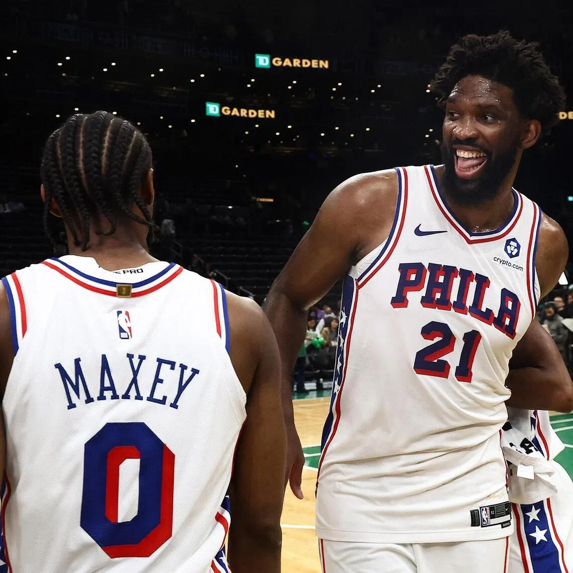 Philadelphia 76ers centre Joel Embiid celebrating with guard Tyrese Maxey after their 109-100 Game 7 victory over the Boston Celtics in their NBA Eastern Conference first-round series at TD Garden in Boston on May 2, 2026.
