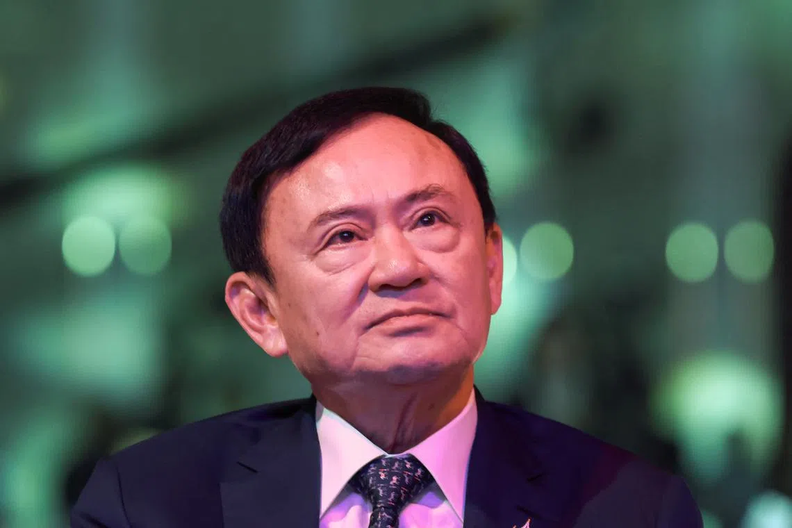 FILE PHOTO: Thailand’s former Prime Minister Thaksin Shinawatra looks on ahead of a panel discussion with Thai broadcaster Nation TV in Bangkok, Thailand, July 9, 2025. REUTERS/Chalinee Thirasupa/ File Photo