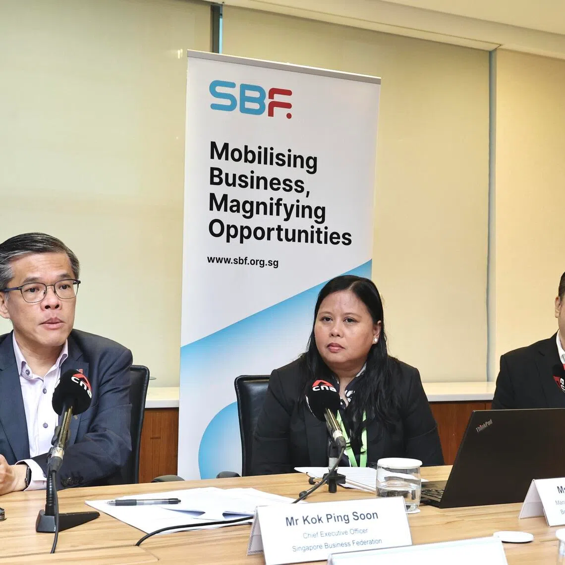 (From left) Singapore Business Federation chief executive officer Kok Ping Soon, Boston Consulting Group Singapore managing director and senior partner Mariam Jaafar, and RSM Singapore head of advisory Terence Ang speak to media at the launch.