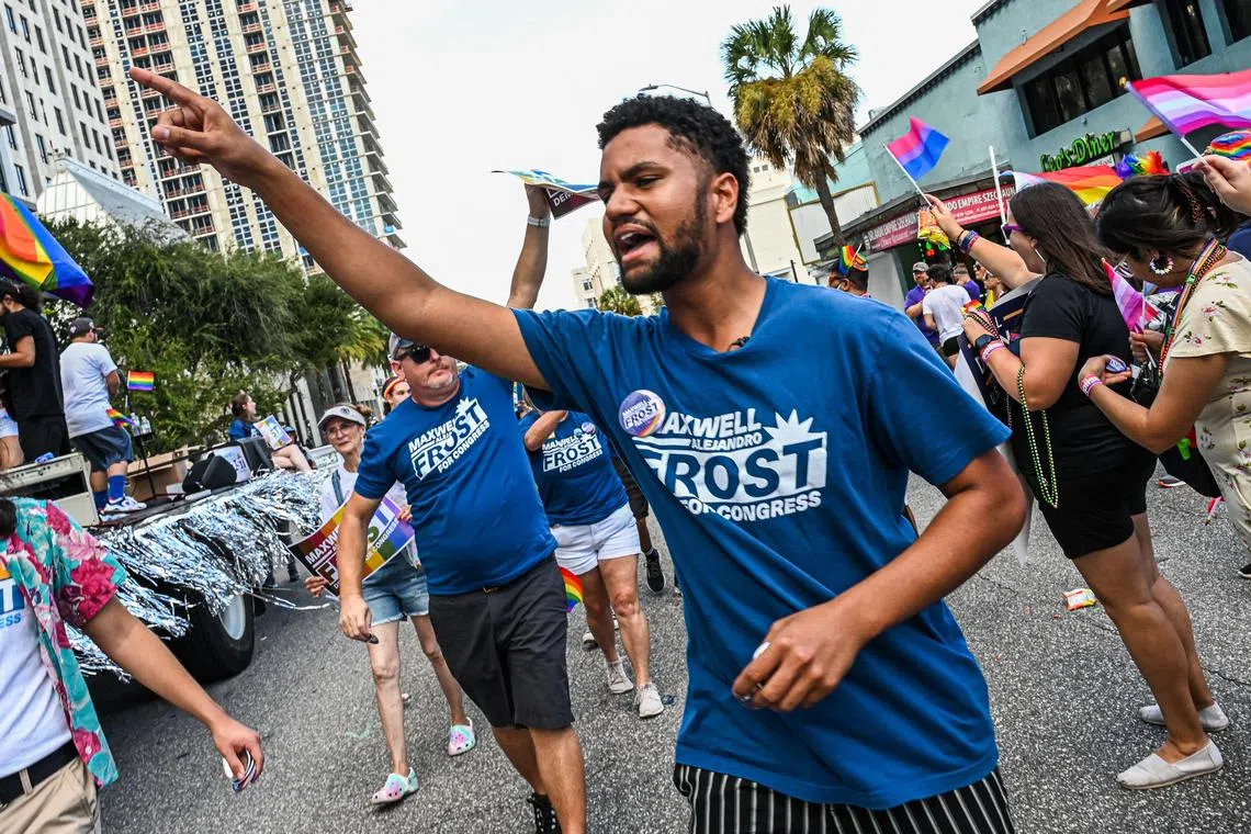 Generation Z member of Congress Maxwell Frost, a 25-year-old African-American, takes part in a Pride Parade in Orlando, Florida. 