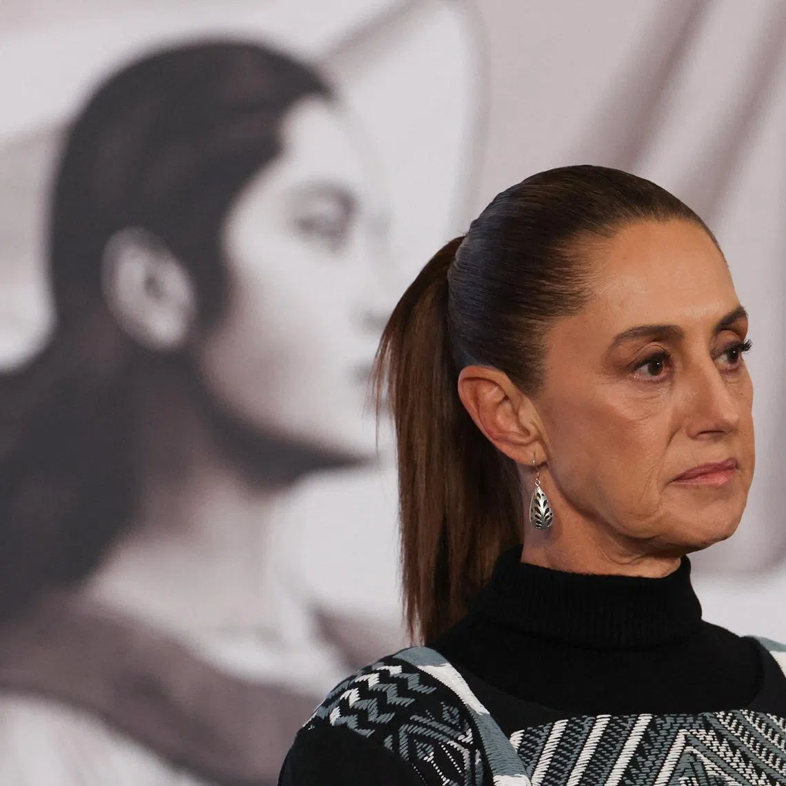 Mexican President Claudia Sheinbaum attends a press conference at the National Palace in Mexico City, Mexico January 27, 2026. REUTERS/Henry Romero