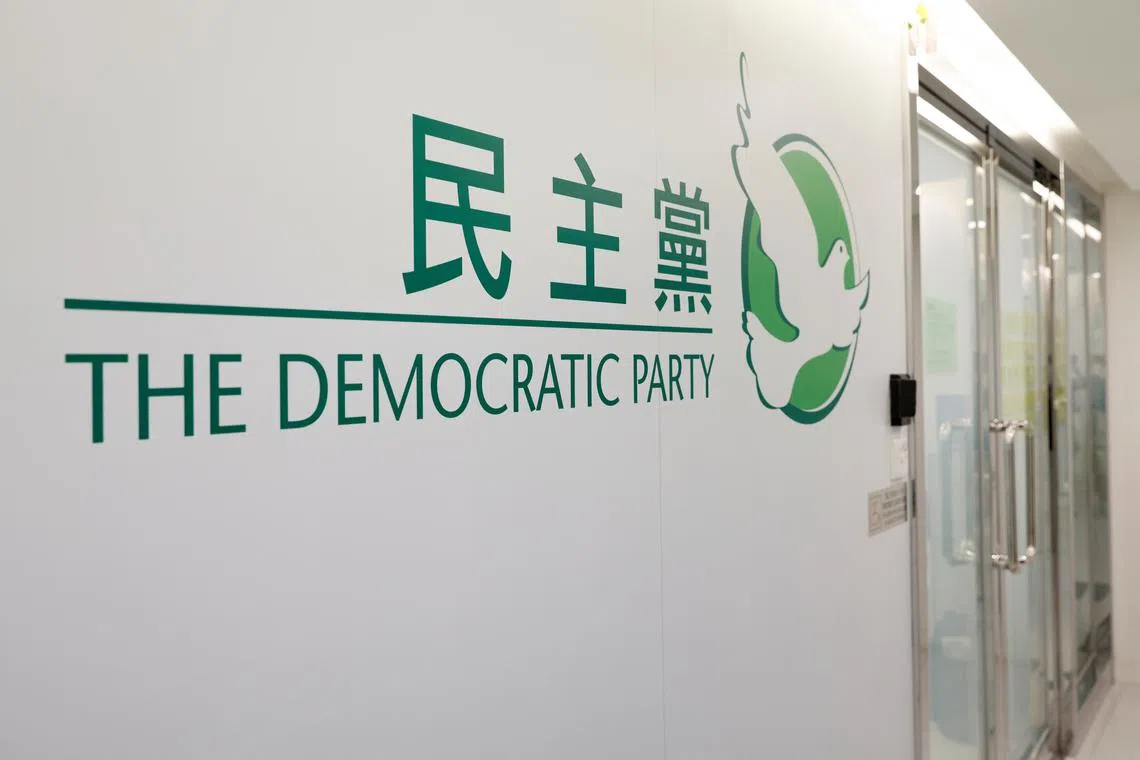 FILE PHOTO: The logo of the Democratic Party is seen in its office, in Hong Kong, China September 26, 2021. REUTERS/Tyrone Siu/File Photo