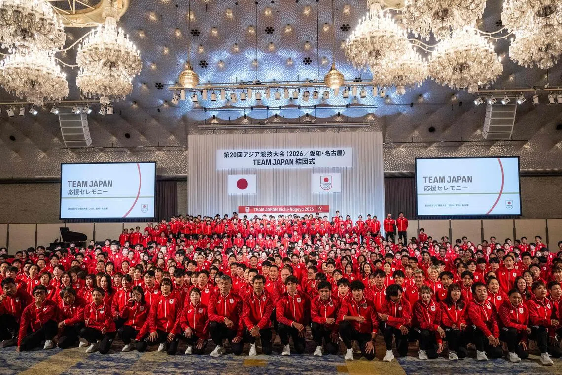 Japanese athletes posing for a group photo after a send-off ceremony in Tokyo for the 2026 Asian Games on Aug 19.