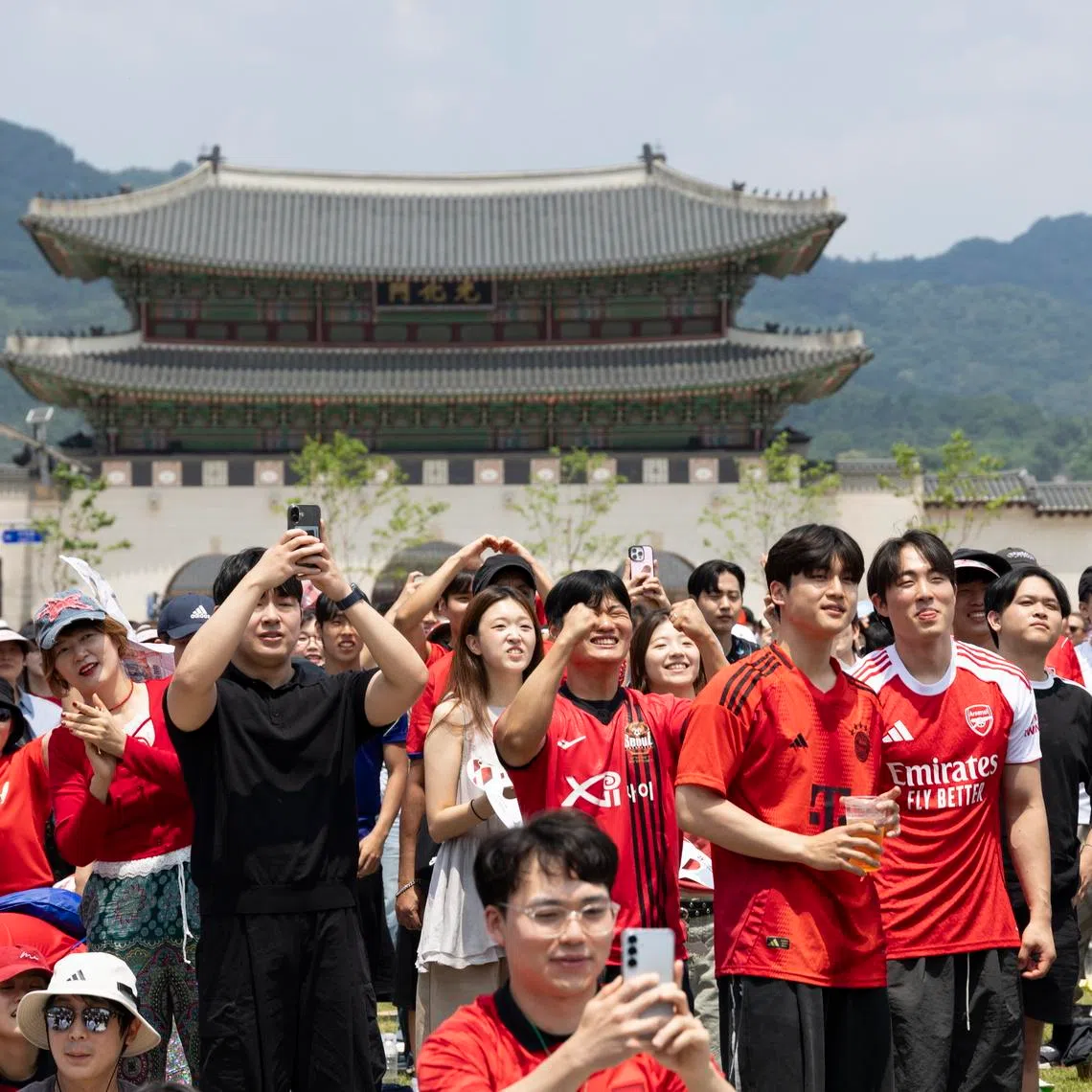 Football fans at Gwanghwamun Square in Seoul, South Korea, June 12, watching the group A preliminary round match between South Korea and Czech Republic at the FIFA World Cup in Mexico.