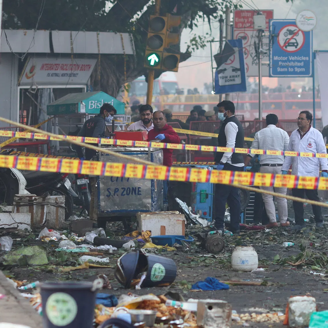 Security personnel and members of the forensic team at the site of an explosion near the historic Red Fort in Delhi, India, on Nov 11.