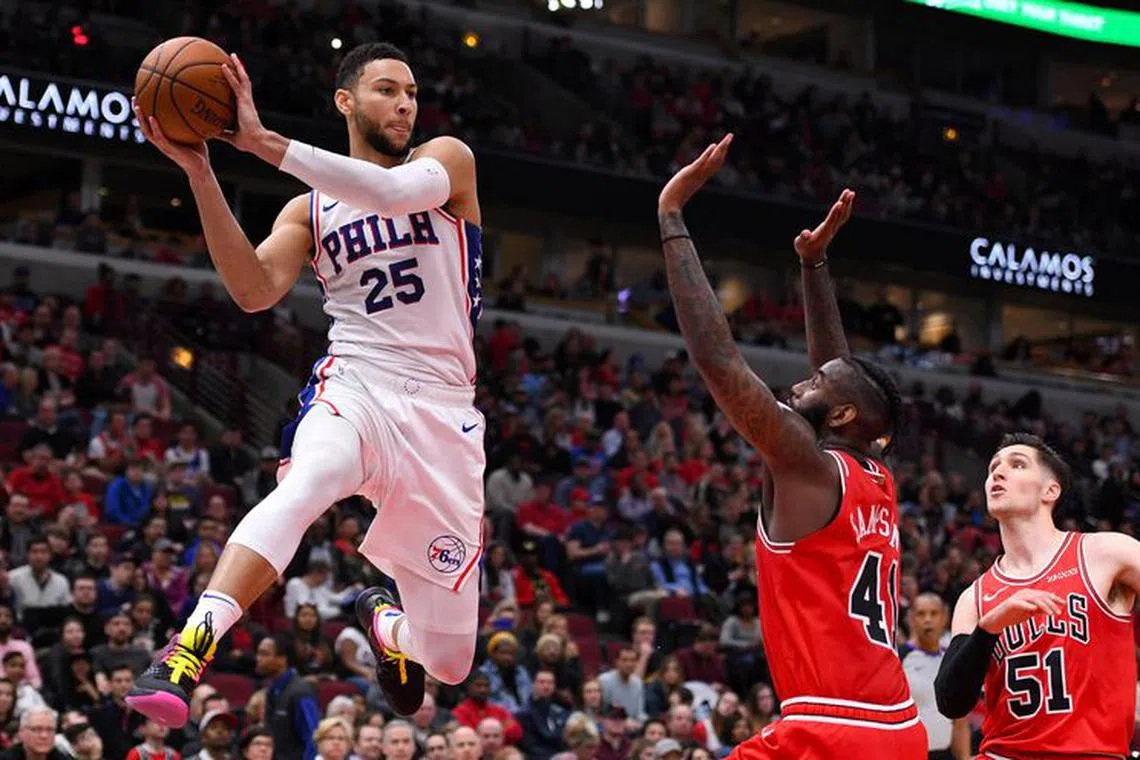 FILE PHOTO: Apr 6, 2019; Chicago, IL, USA; Philadelphia 76ers guard Ben Simmons (25) makes a pass against Chicago Bulls forward JaKarr Sampson (41) during the second half at the United Center. Mandatory Credit: Mike DiNovo-USA TODAY Sports/File Photo