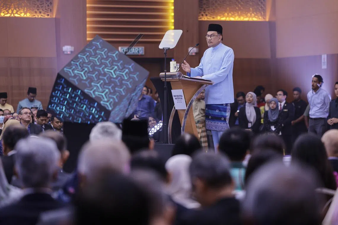 KUALA LUMPUR - PM Anwar Ibrahim delivering his speech at the launch of Malaysia's New Industrial Master Plan 2030 on Friday.