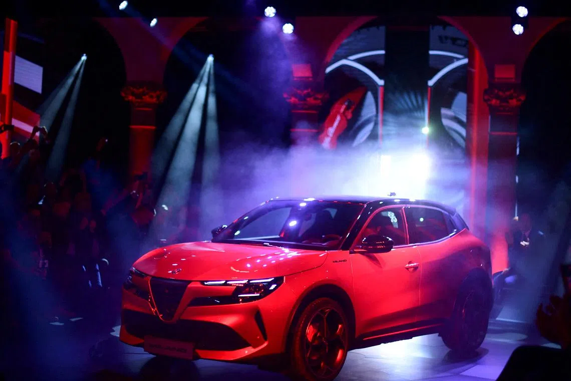 FILE PHOTO: Stellantis premium brand Alfa Romeo reveals the Milano, its first fully electric car (EV), during an event in Milan, Italy April 10, 2024. REUTERS/Daniele Mascolo/File Photo