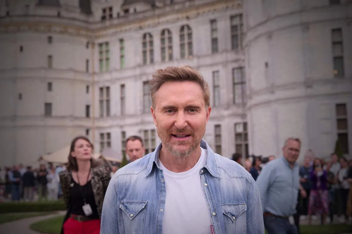 French DJ and singer David Guetta poses prior to his performance at Chateau de Chambord, in France's Loire Valley.