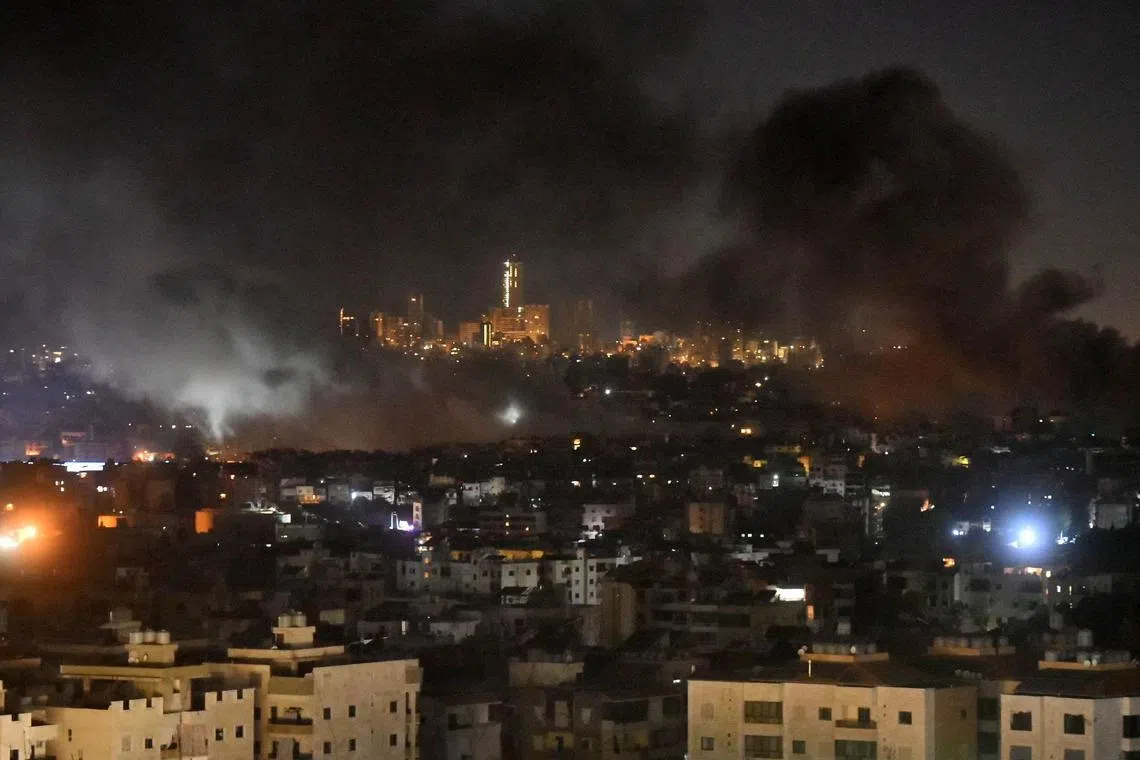 Smoke rises from areas targeted by an Israeli airstrike in Beirut’s southern suburbs late on Oct 20.