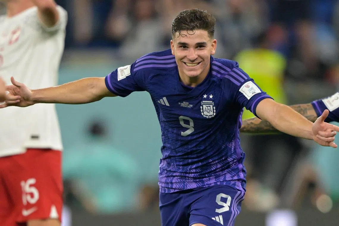 Forward Julian Alvarez celebrates scoring Argentina's second goal against Poland.