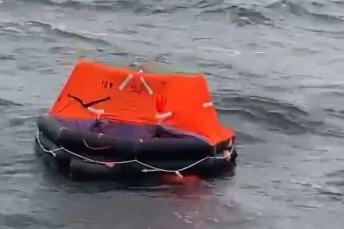A screenshot from a video posted online of what is thought to be a life raft from the sunken vessel.