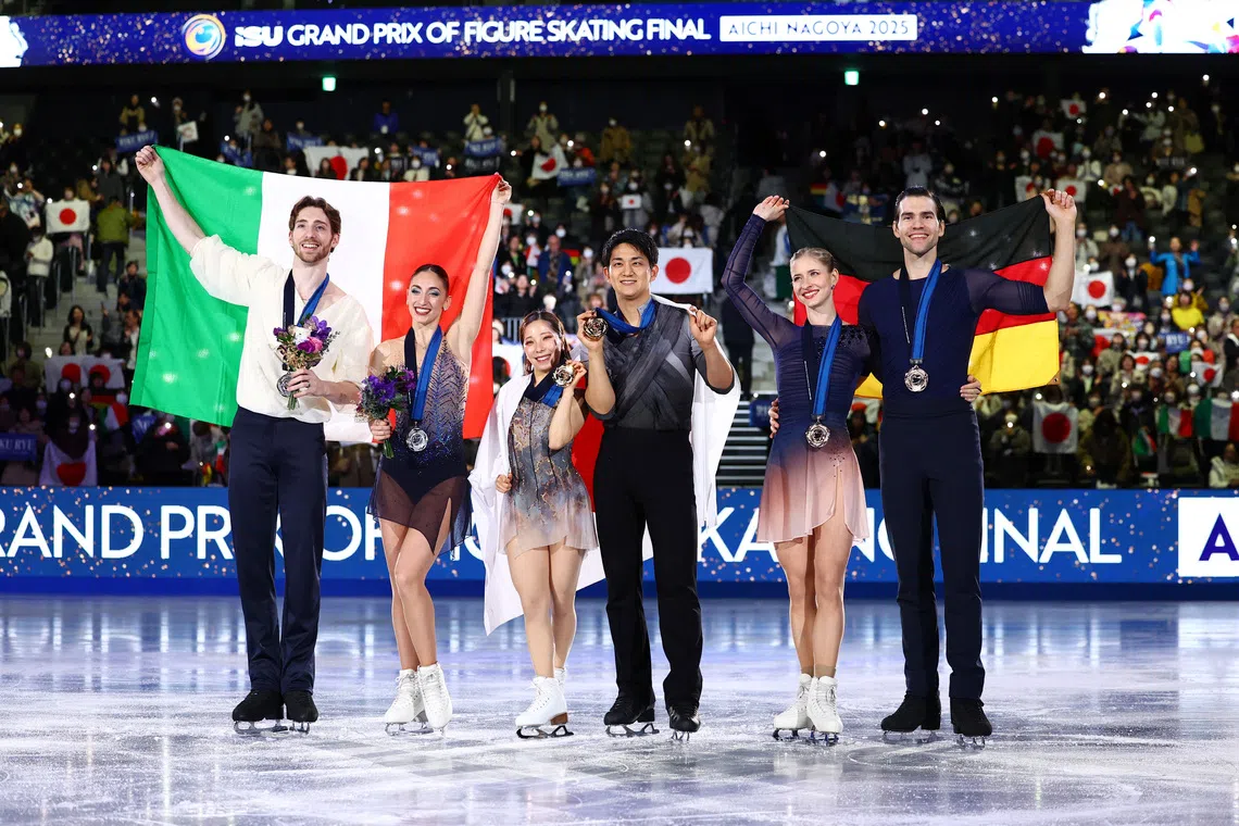 Figure Skating - ISU Grand Prix of Figure Skating - Grand Prix Final - Aichi International Arena, Nagoya, Japan - December 5, 2025 Japan's Riku Miura and Ryuichi Kihara celebrate with their medals after winning the pairs free skating alongside second placed Sara Conti and Niccolo Macii of Italy and third placed Minerva Fabienne Hase and Nikita Volodin of Germany REUTERS/Issei Kato