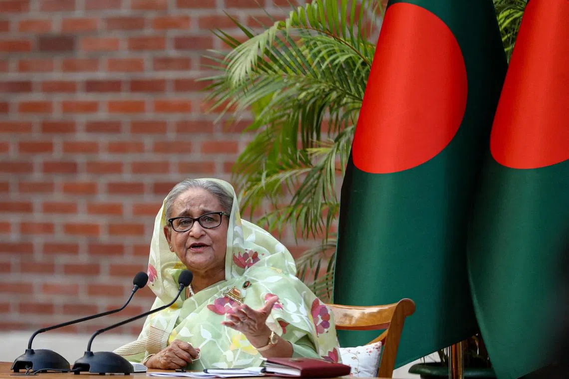 Ms Hasina will return to her country when its new caretaker government decides to hold elections, her son has said.