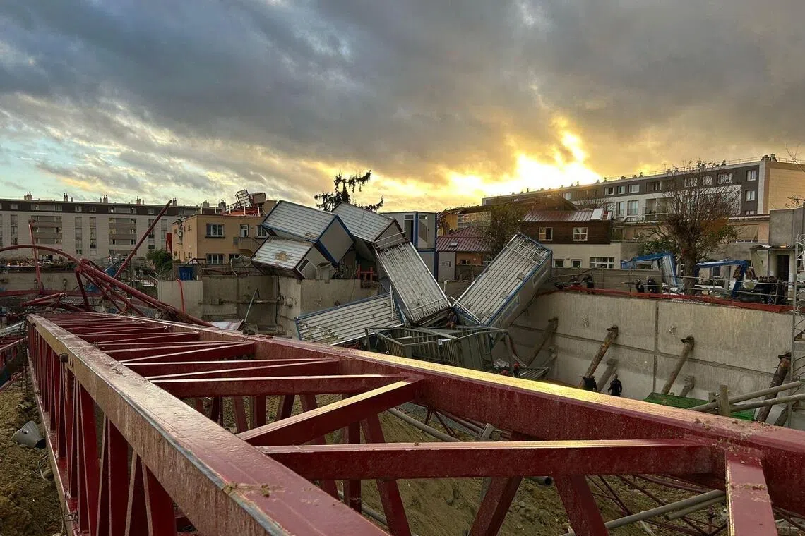 This handout photograph taken and released on October 20, 2025 by the Syndicat Alliance Police Nationale (National Police Alliance Union) shows a collapsed crane which fell during high winds in Ermont, Val-d'Oise, on October 20, 2025. One person was killed and four others were seriously injured on October 20, 2025 during a violent wind event in Ermont, Val-d'Oise, the prefecture told AFP, without specifying the circumstances of the deaths. "One person has died, four are in critical condition, and five are in relative condition," the prefecture said during which "cranes fell and roofs were torn off." Eighty firefighters, 50 police officers, and 20 members of the SAMU (emergency medical service) were mobilized to the scene, according to the same source. (Photo by Handout / Syndicat Alliance Police Nationale / AFP)