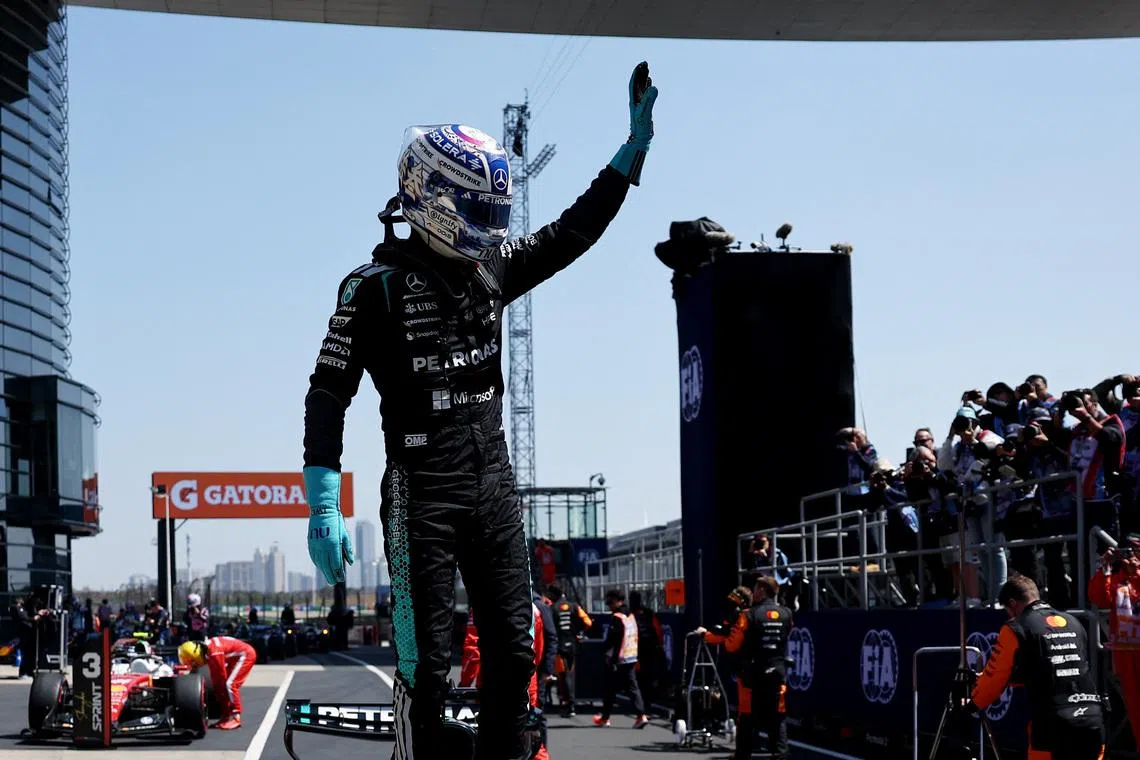 Formula One F1 - Chinese Grand Prix - Shanghai International Circuit, Shanghai, China - March 14, 2026 Mercedes' George Russell celebrates after winning the sprint race REUTERS/Jakub Porzycki