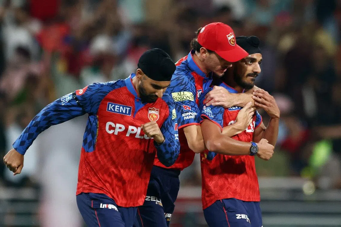 Cricket - Indian Premier League - IPL - Punjab Kings v Rajasthan Royals - Maharaja Yadavindra Singh International Cricket Stadium, New Chandigarh, India - April 28, 2026 Punjab Kings' Arshdeep Singh celebrates with teammates after taking the wicket of Rajasthan Royals' Vaibhav Suryavanshi REUTERS/Mihir Singh