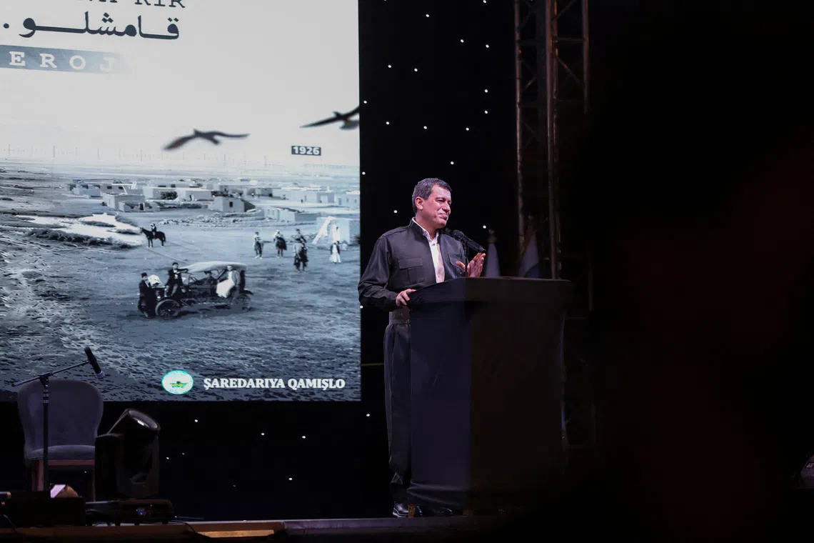 SDF commander Mazloum Abdi delivers a speech during a celebration marking the centenary of the city of Qamishli, Syria, August 20, 2026. REUTERS/Orhan Qereman