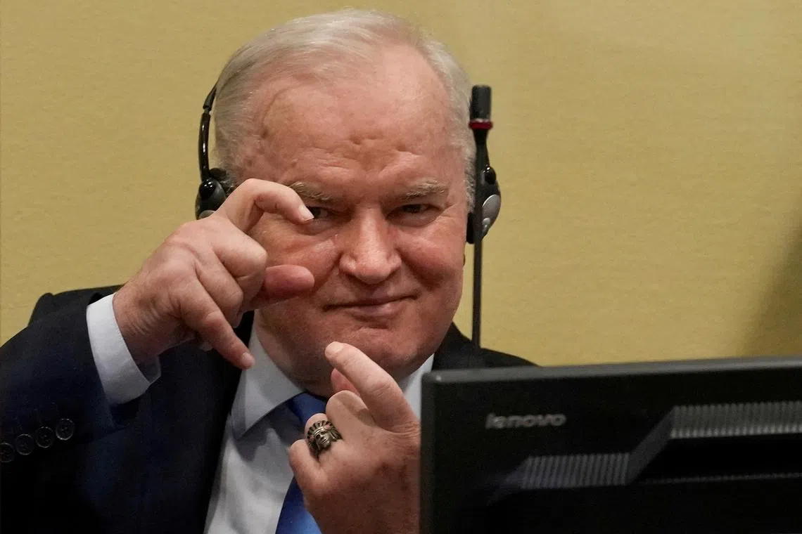 FILE PHOTO: Former Bosnian Serb military leader Ratko Mladic gestures prior to the pronouncement of his appeal judgement at the UN International Residual Mechanism for Criminal Tribunals (IRMCT) in The Hague, Netherlands June 8, 2021. Peter Dejong/Pool via REUTERS/File Photo