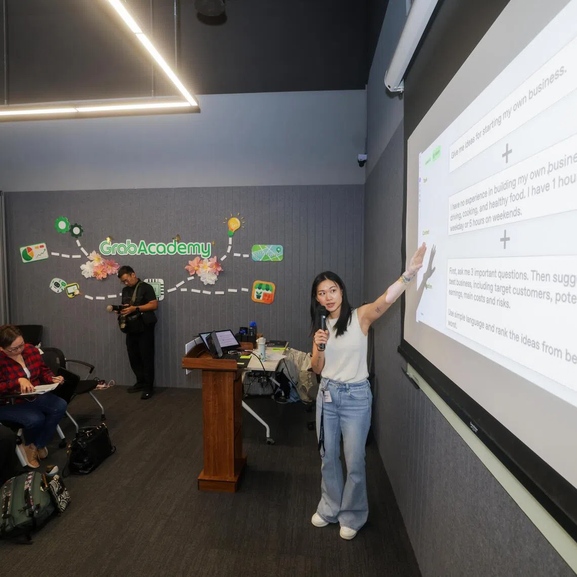 Around 50 female drivers and delivery riders attending the first workshop organised by Grab and OpenAI, as part of a two-year programme that seeks to impart practical AI skills to gig workers and merchants.