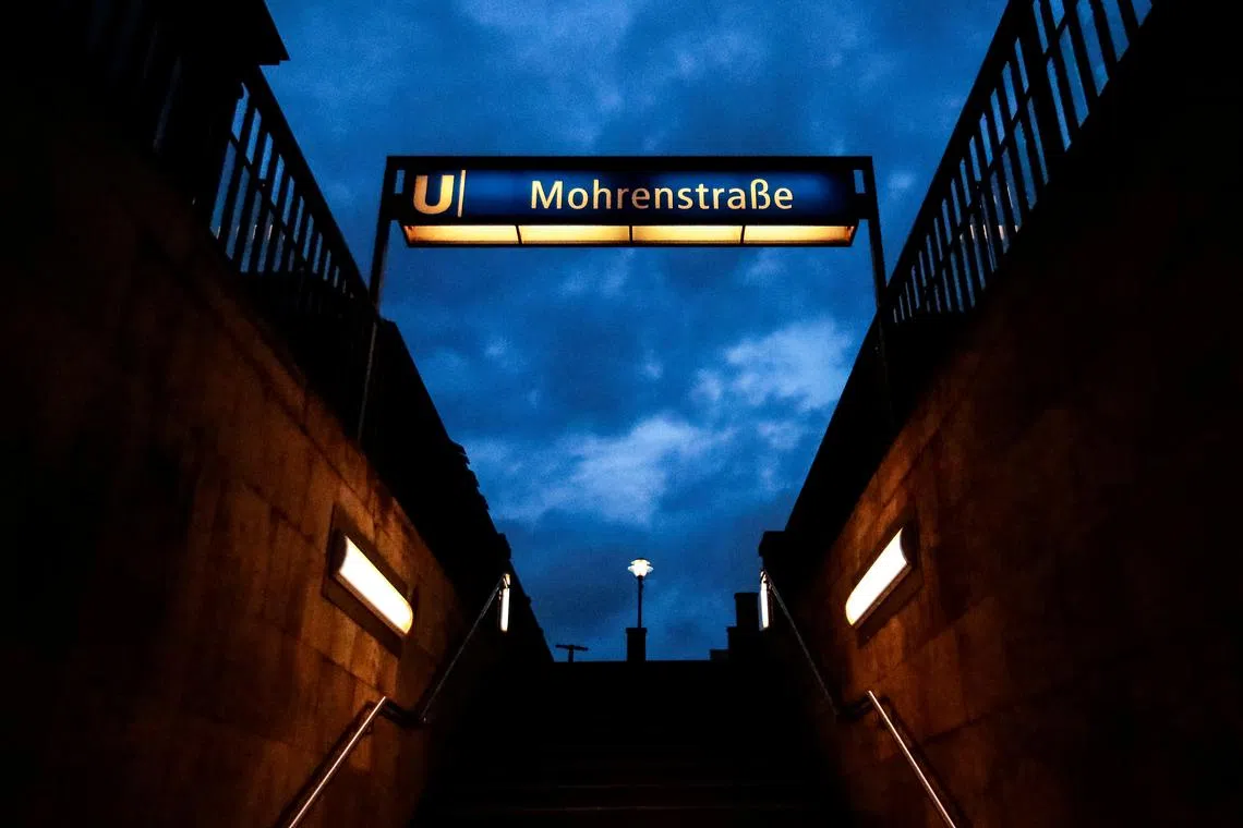 FILE PHOTO: A sign for Mohrenstrasse subway station is seen in central Berlin, Germany, July 15, 2020. REUTERS/Hannibal Hanschke/File Photo