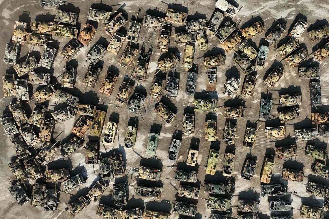 A cemetery of army tanks and armoured vehicles that were confiscated by rebel forces during the fall of the regime of former Syrian president Bashar al-Assad, as seen on Nov 27, 2025 in the northern Syrian city of Idlib.