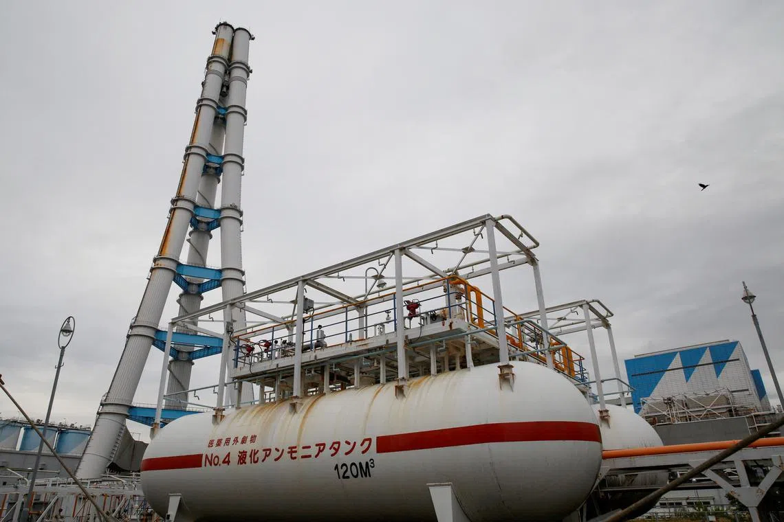 FILE PHOTO: General view shows an ammonia tank in the foreground at JERA's Hekinan thermal power station in Hekinan, central Japan October 18, 2021. REUTERS/Yuka Obayashi/File Photo