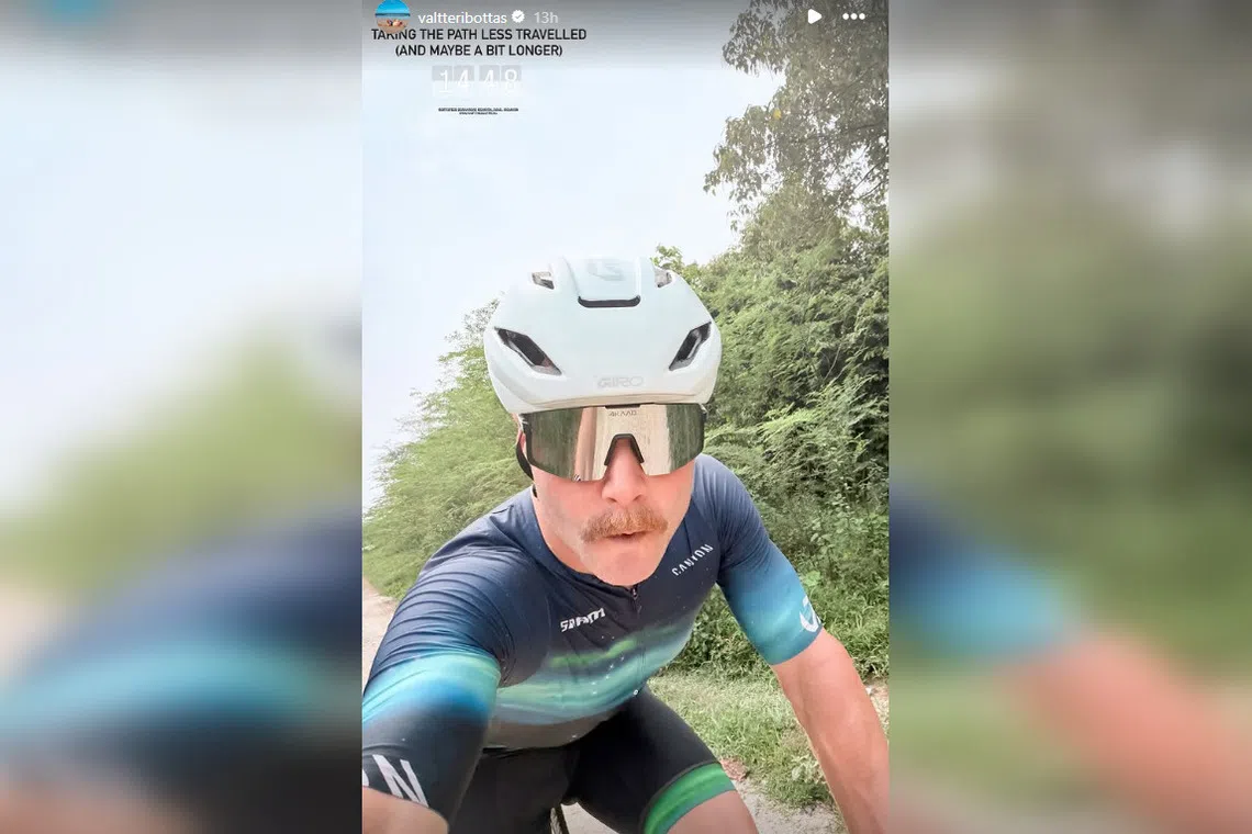 Valtteri Bottas is cycling from Sepang to Singapore, instead of flying like most of his peers.