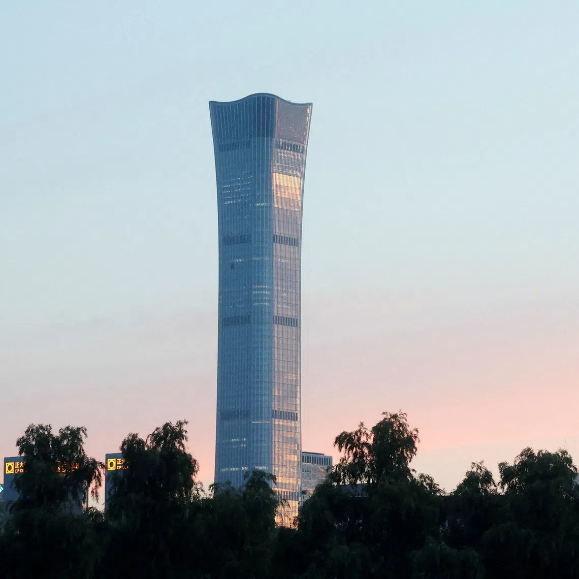 The CITIC Tower in Beijing had visible damage after the crash killed the plane’s pilot and injured 13 other people at the site.
