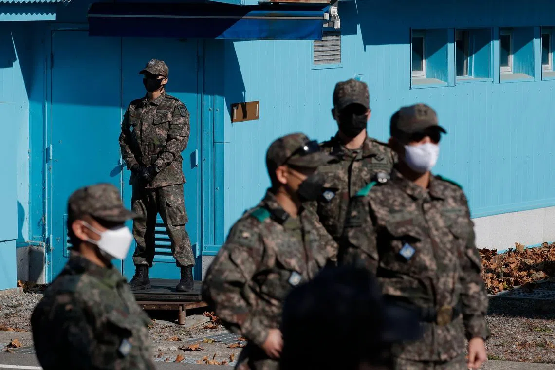 South Korean soldiers stand on the southern side of Panmunjom in the Demilitarized Zone on Nov 4, 2020. 