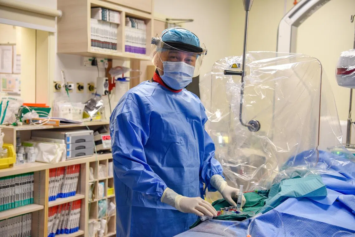 ST20230828_202376358015-Eugene Tan-jtaward31/

Senior Consultant, Department of Cardiology, and Senior Adviser at the National University Heart Centre, Singapore, Professor, Tan Huay Cheem, 60, after a procedure on August 28, 2023./

(ST PHOTO: EUGENE TAN)