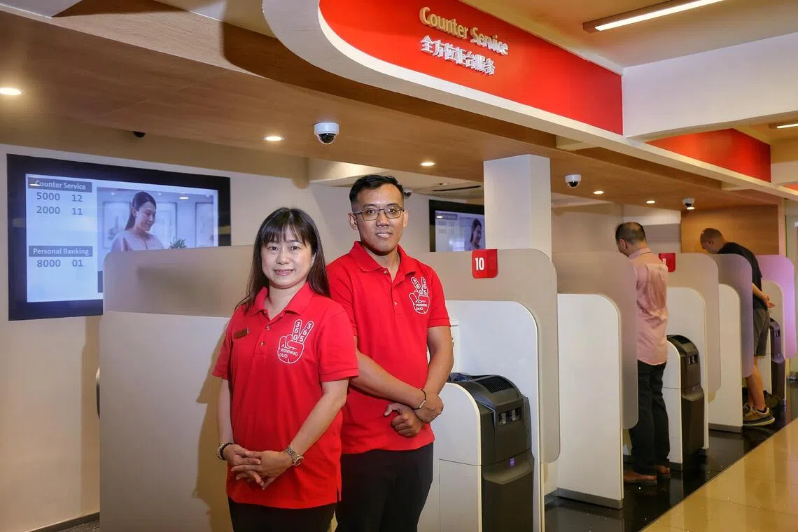 OCBC Bank customer service officer Chai Mei Li (left) and bank teller Robert Tan prevented Jim from losing the bulk of his life savings.
