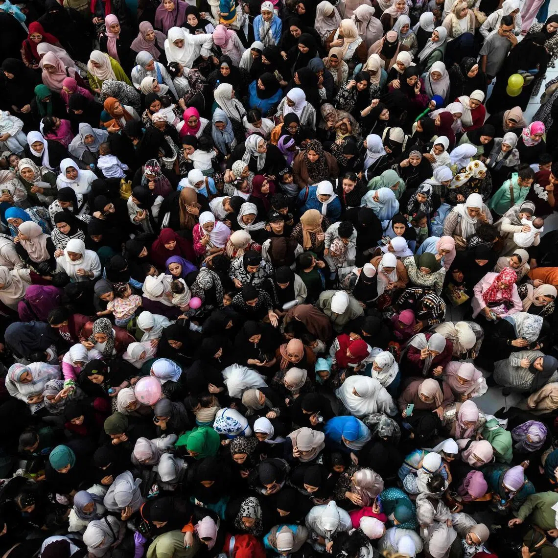 Muslims in Cairo gather to start Eid al-Adha, or the Great Day of Sacrifice, marking the end of the annual haj pilgrimage.

