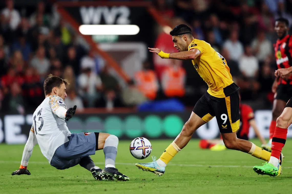 Wolverhampton Wanderers' Mexican striker Raul Jimenez attempting to score past Bournemouth goalkeeper Neto in an English Premier League match in August.