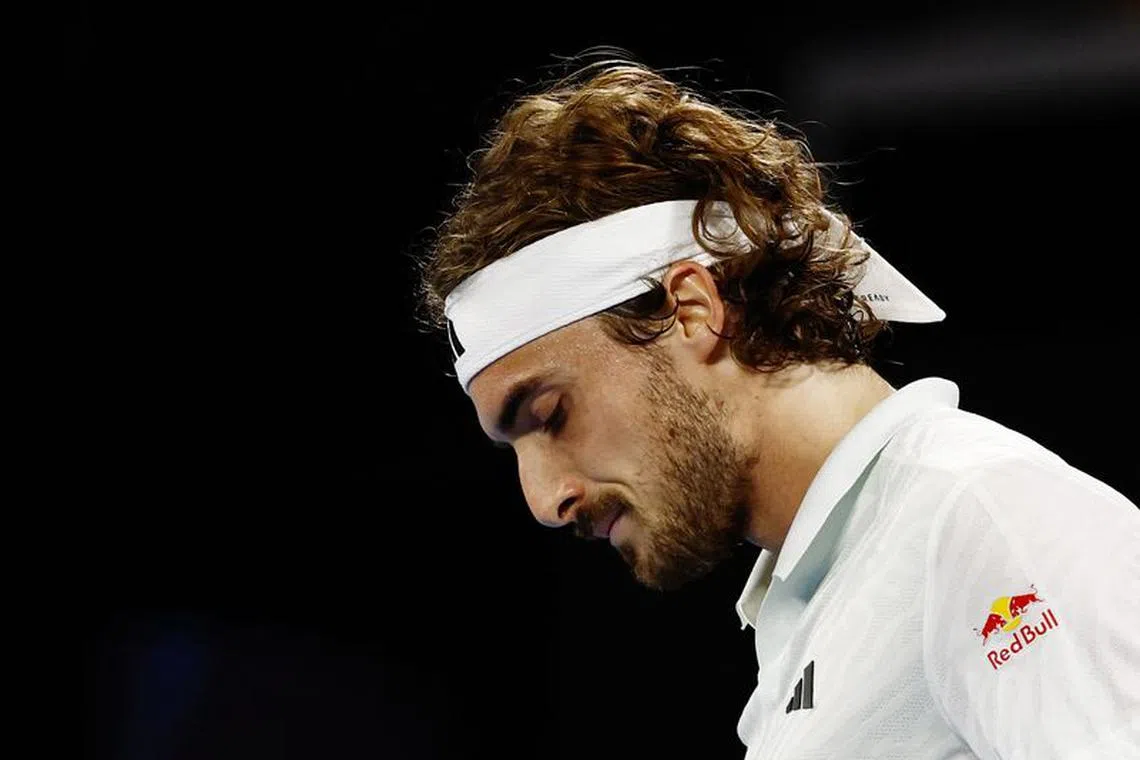 Tennis - Australian Open - Melbourne Park, Melbourne, Australia - January 21, 2024 Greece’s Stefanos Tsitsipas reacts during his fourth round match against Taylor Fritz of the U.S. REUTERS/Issei Kato