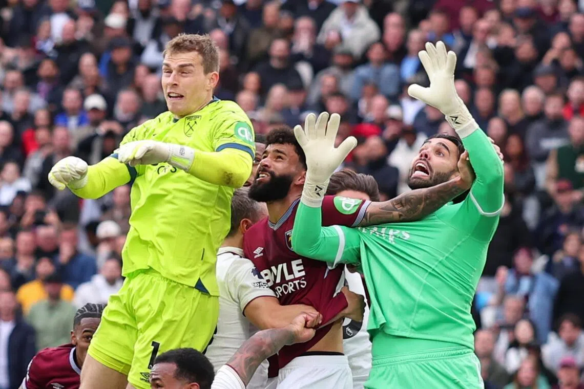 West Ham United’s Pablo obstructing Arsenal goalkeeper David Raya with his arm, behind Hammers custodian Mads Hermansen, during a corner in stoppage time of their Premier League game on May 10. Callum Wilson’s equaliser after Raya dropped the ball was disallowed following the video assistant referee’s intervention and the Gunners secured a crucial 1-0 away win.