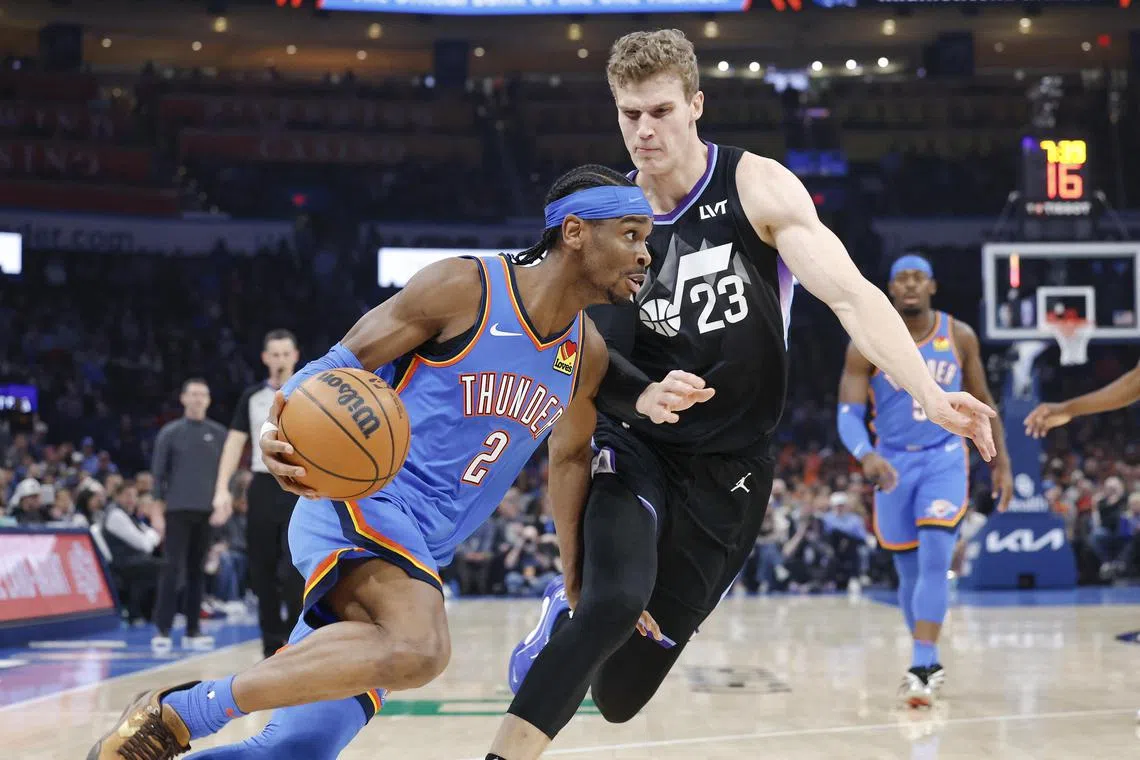 Oklahoma City Thunder guard Shai Gilgeous-Alexander driving around Utah Jazz forward Lauri Markkanen during the first quarter at Paycom Centre on Jan 22. Gilgeous-Alexander scored a career-high 54 points as the Thunder overpowered the Jazz 123-114.