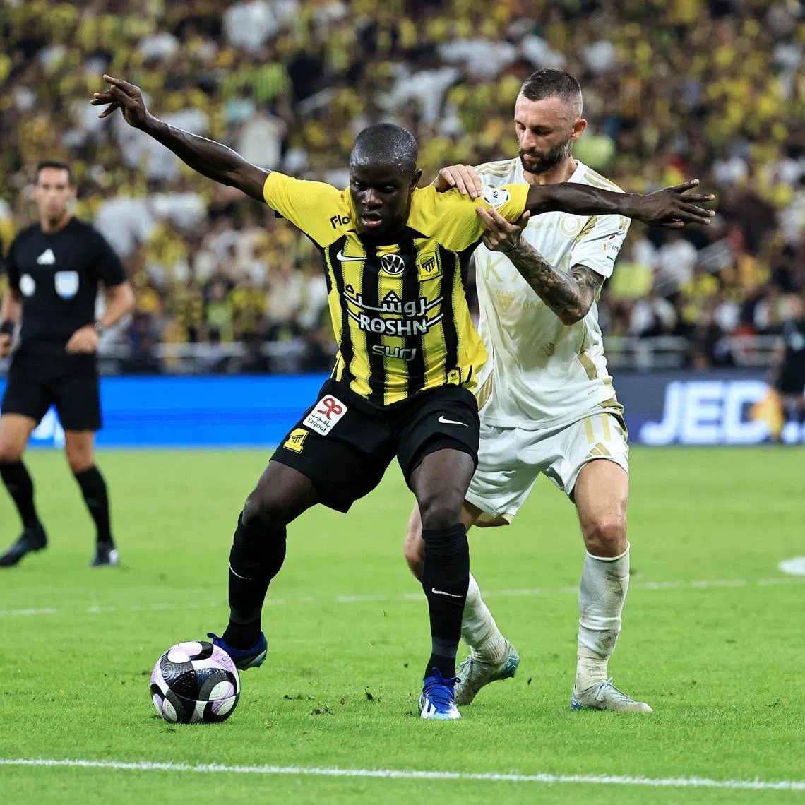 Soccer Football - Saudi Pro League - Al Ittihad v Al Nassr - King Abdullah Sport City, Jeddah, Saudi Arabia - December 6, 2024 Al Nassr's Marcelo Brozovic in action with Al Ittihad's N'Golo Kante REUTERS/Stringer