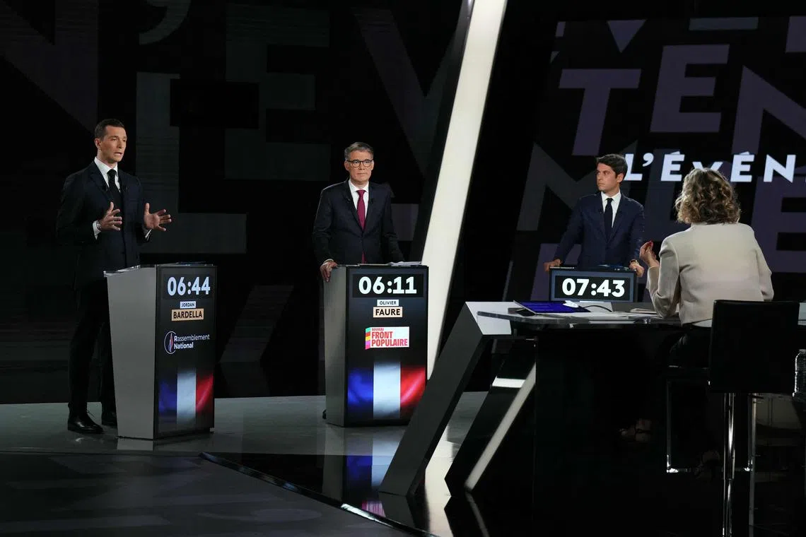 (From left) French Rassemblement National party President Jordan Bardella, First Secretary of the Socialist Party Olivier Faure and French Prime Minister Gabriel Attal during a political debate on June 27.