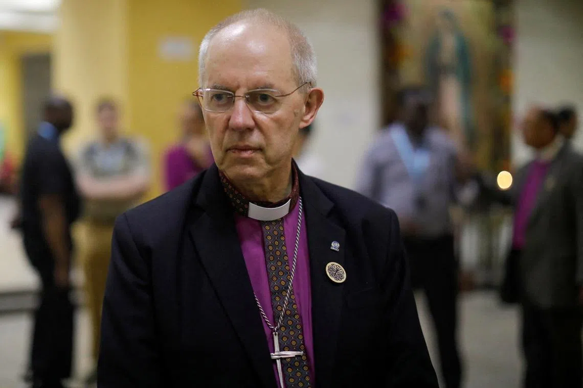 FILE PHOTO: Archbishop of Canterbury Justin Welby looks on as he speaks with the press after a visit to the grave of Saint Oscar Arnulfo Romero, during a visit to El Salvador, at The Metropolitan Cathedral in San Salvador, El Salvador, June 4, 2024. REUTERS/Jose Cabezas/File Photo