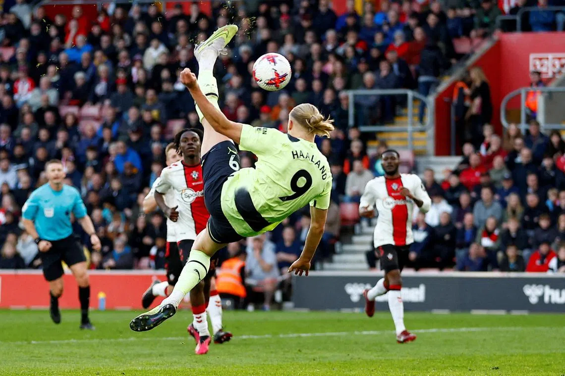 Manchester City's Erling Haaland scores their third goal.