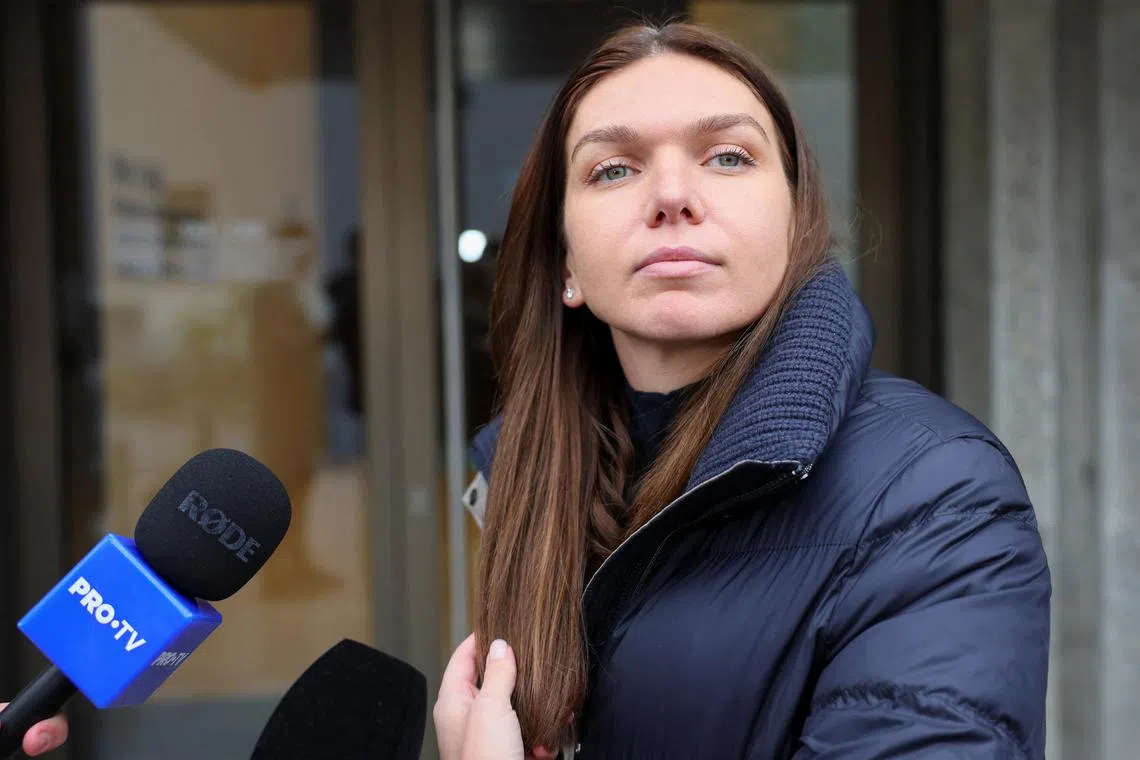 Tennis player Simona Halep of Romania addresses the media, after a hearing for a doping case against her, at the Court of Arbitration for Sport (CAS) in Lausanne, Switzerland February 9, 2024. REUTERS/Denis Balibouse/File Photo